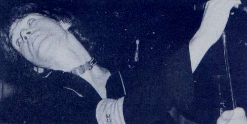 Mr John Foxx of Ultravox sporting a dog collar...shock horror (Don't Care collection)