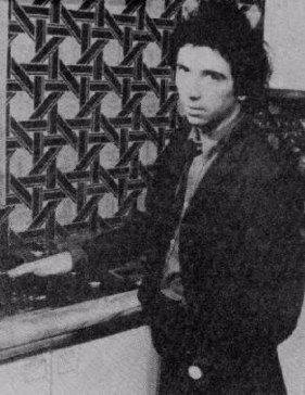 Pete Shelley painting the kitchen red - (Dont Care collection)