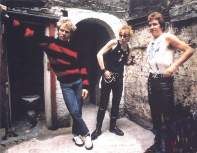 The Sex Pistols waiting for Sid to sign in Virgns plush office suite - 'Satellite CD' (Dont Care collection)